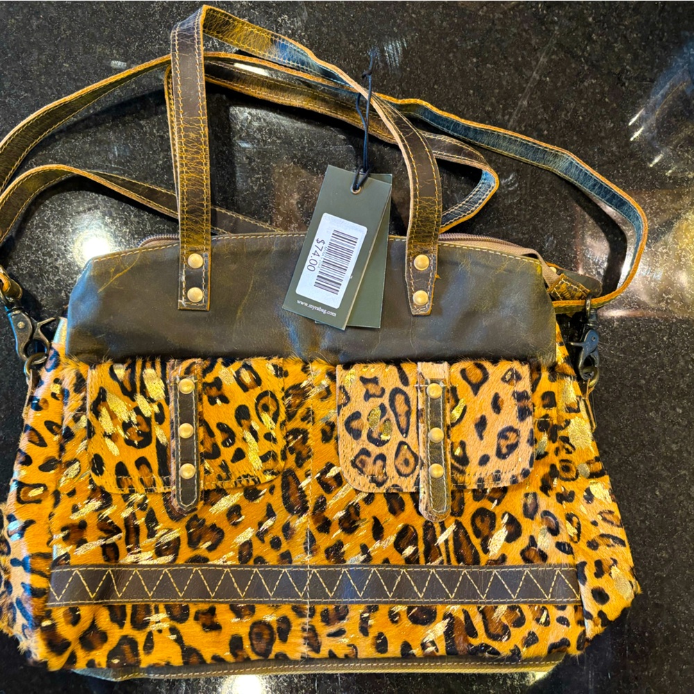 Myra cheetah print bag. Never used.